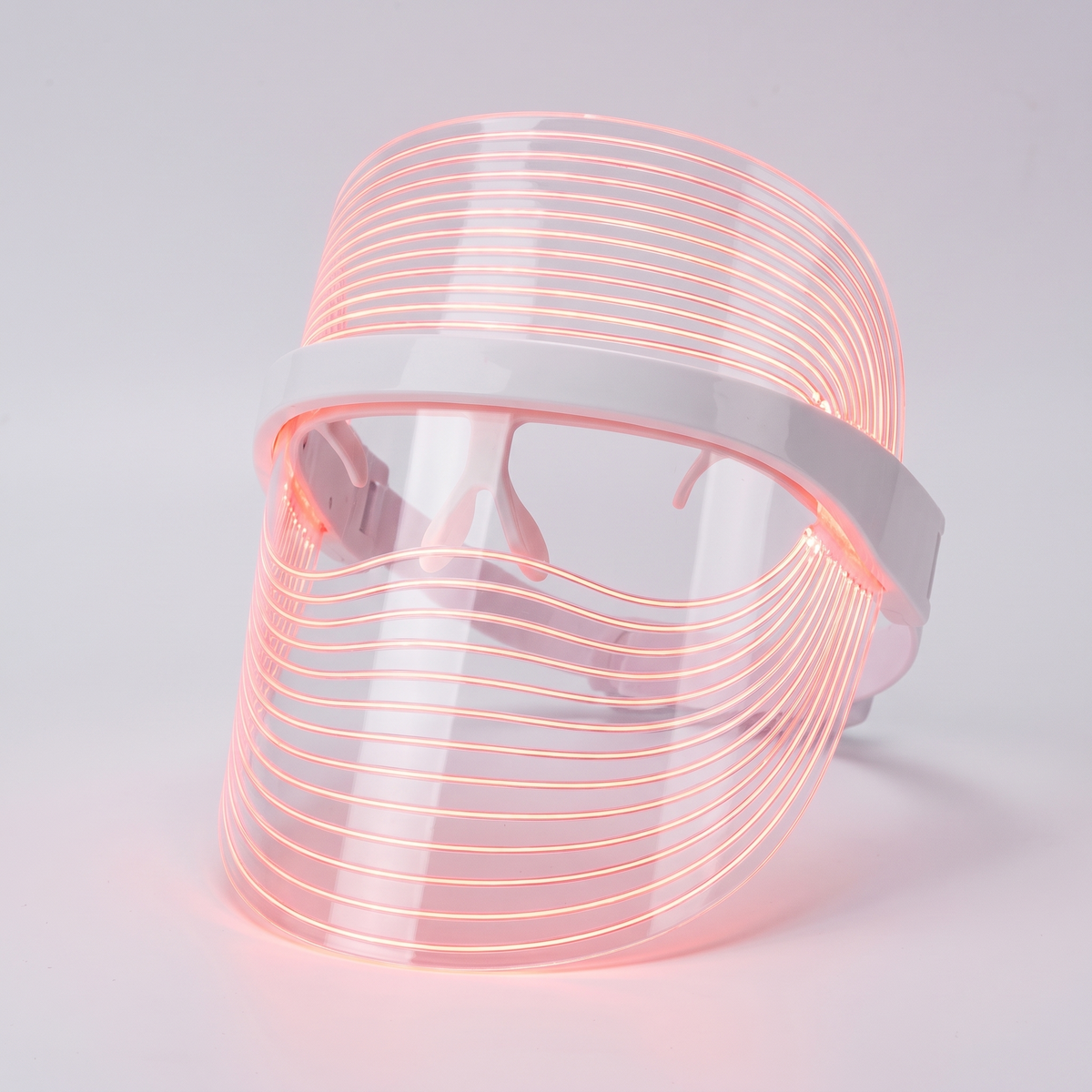 Red Light Therapy Face Mask - studio hero shot, red LED glow
