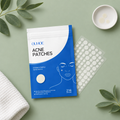 Hydrocolloid acne patches flat lay on sage green surface